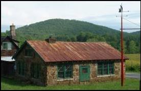 Blacksmith Shop with Blacksmith Ridge in Background